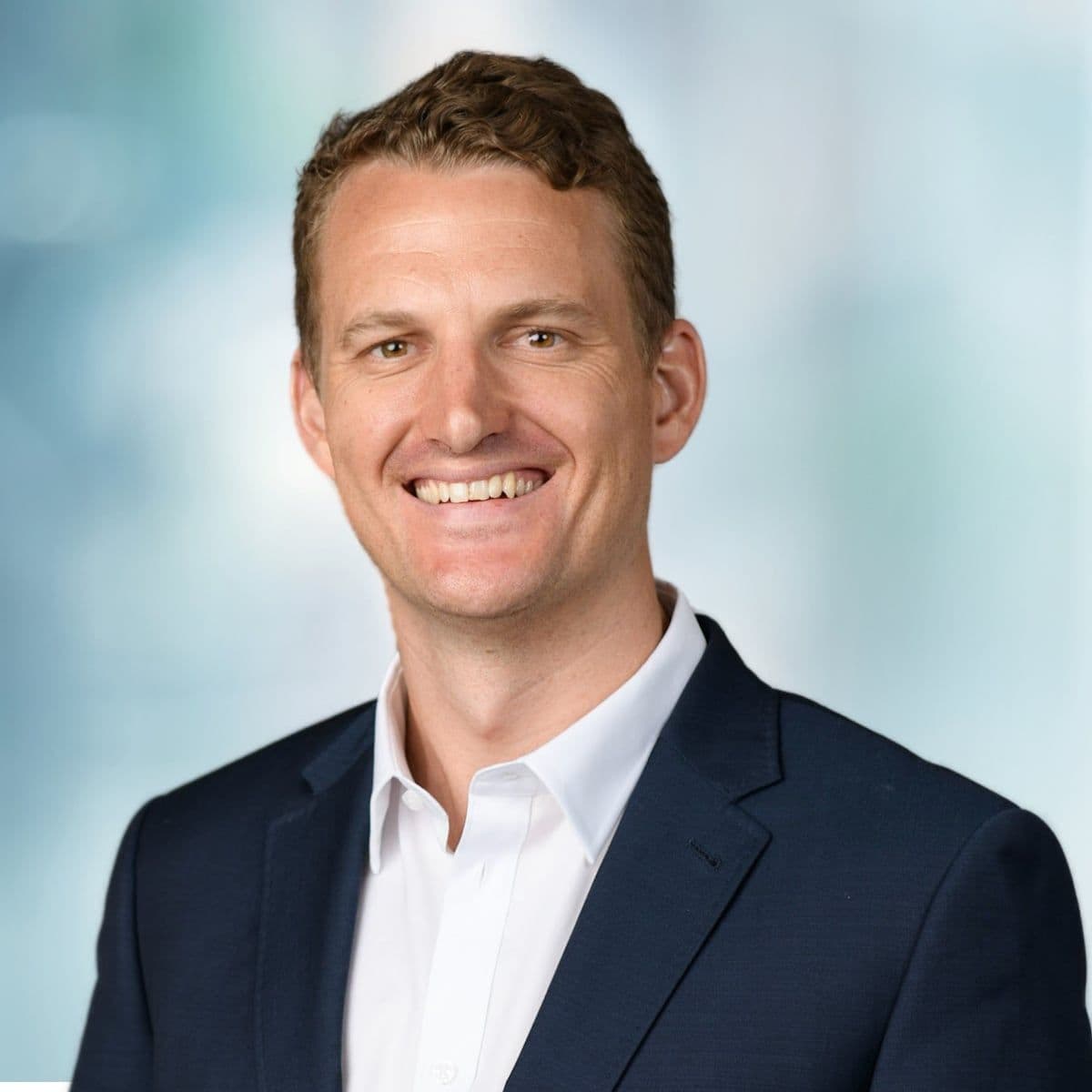 Portrait image of Dr Tom Clifton